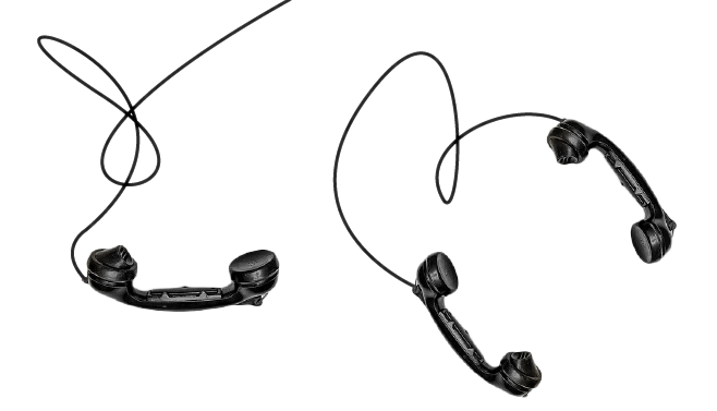 old-fashioned black phones with tangled wires